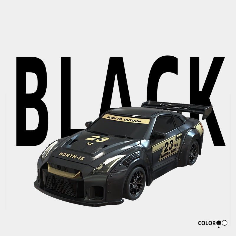 Black toy car with gold accents on a white background with the word 'BLACK' above it.