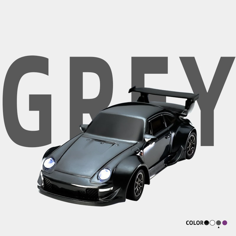 Black sports car with a large 'GREY' text on a white background
